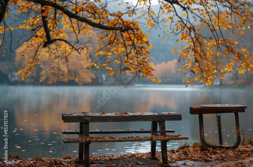 Empty Picnic Table By A Foggy Lake In Autumn