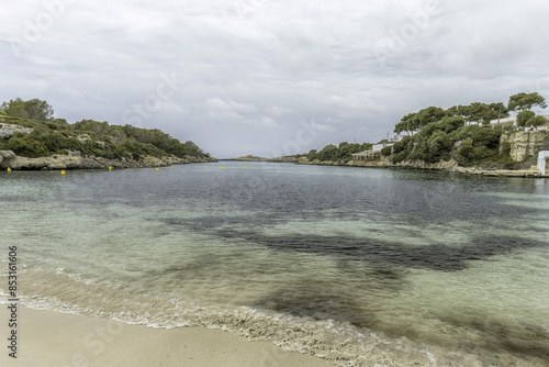 Calm Waters of Cala Santandria, Menorca photo