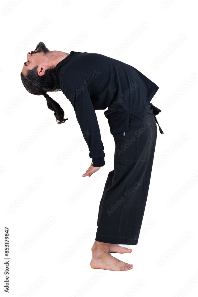 A man dressed in black doing yoga over transparent background. Suryanamaskar yoga pose. A man dressed in black doing yoga over transparent background. Suryanamaskar yoga pose.