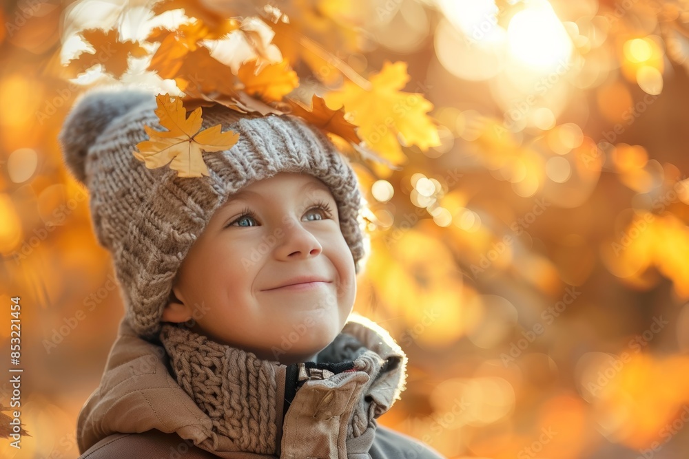 Smiling child in hat exploring the bright golden autumn foliage Smiling child in hat exploring the bright golden autumn foliage