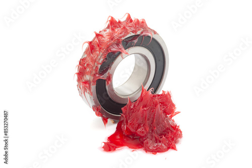 Two tapered roller bearings with red lithium grease (Machinery Lubrication). Isolated on a white background. Front view. photo