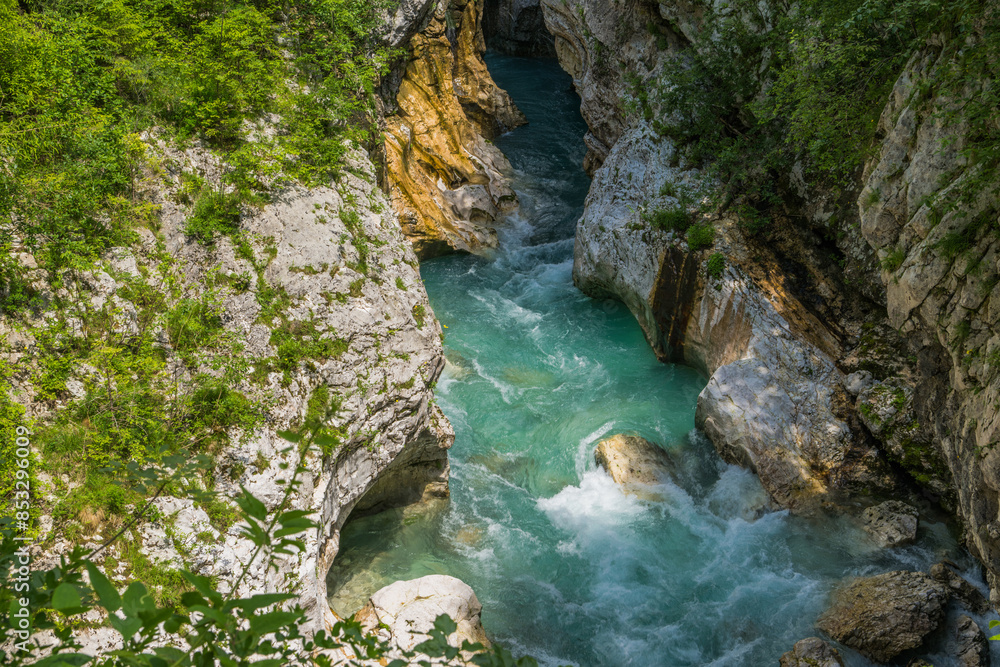 Fototapeta premium Turquoise River Flowing Through A Mountain Gorge. Soca River, Slovenia.