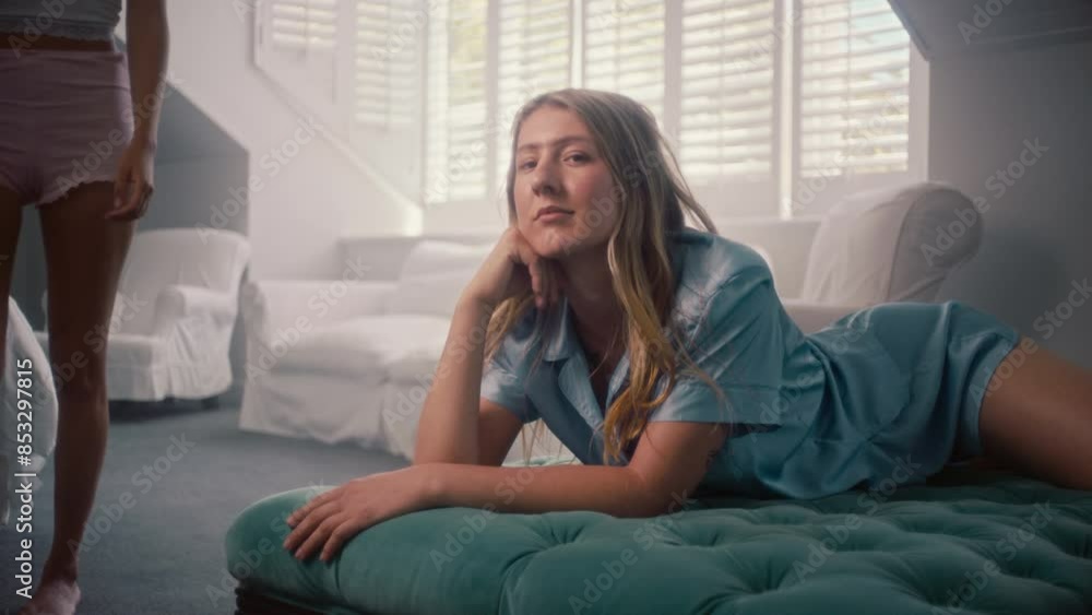 Woman Looking At Camera while Lying and Relaxing Woman Looking At Camera while Lying and Relaxing