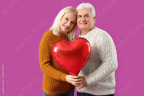 Happy mature couple with he...