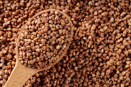 Buckwheat Grains in Wooden Spoon, Copy Space