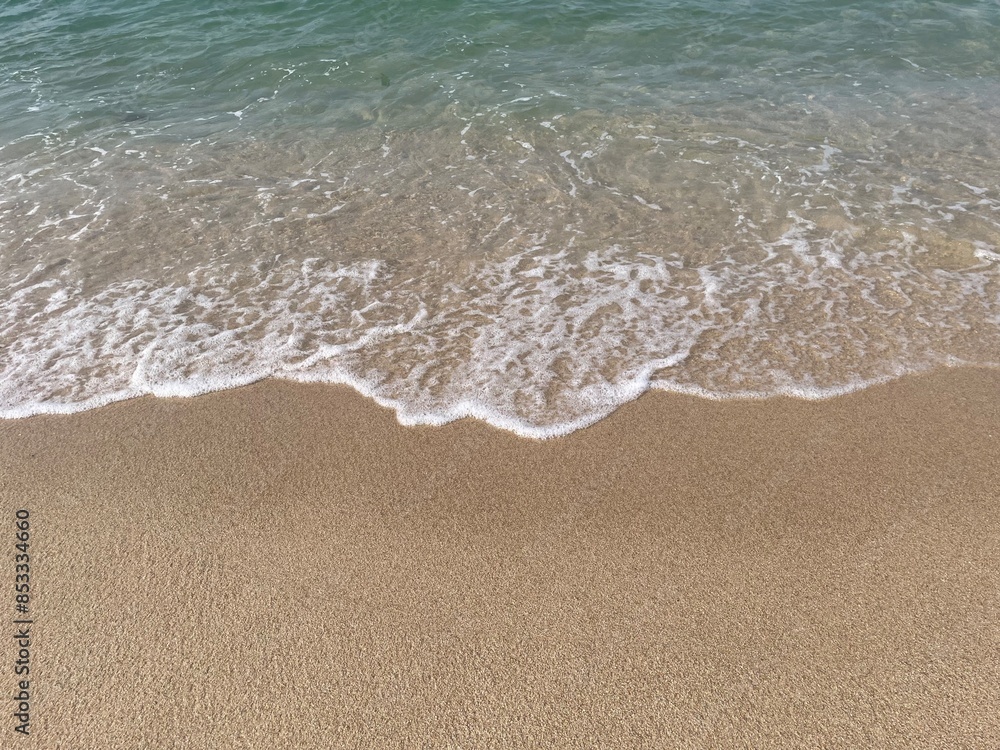 the background of the waves on the beach the background of the waves on the beach