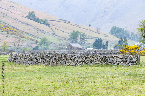 Old stone sheep pens in Lake District National Park. photo