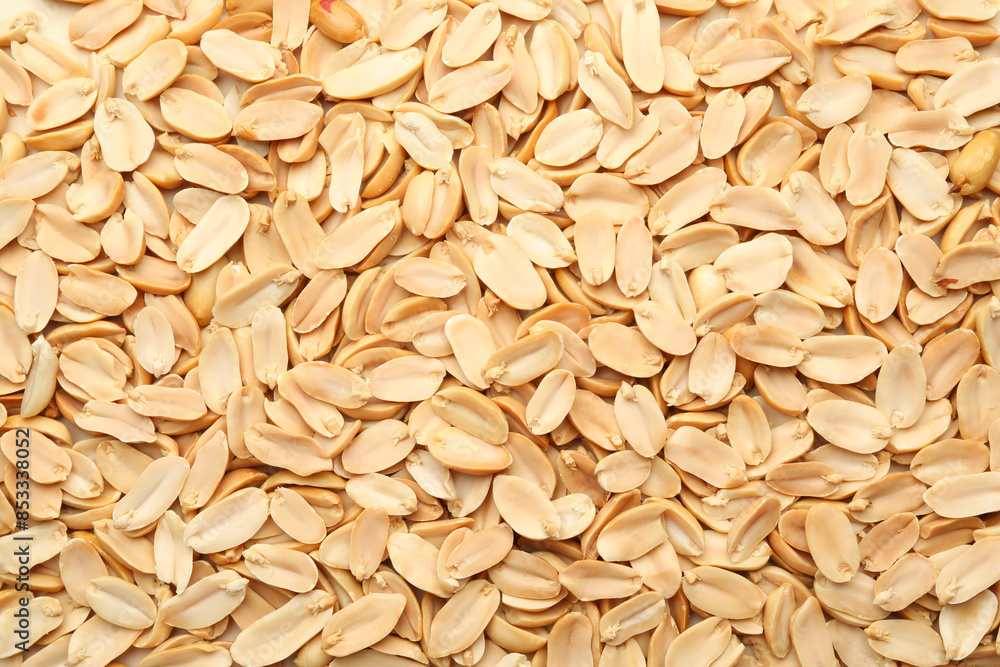 Fresh peeled peanuts as background, top view Fresh peeled peanuts as background, top view