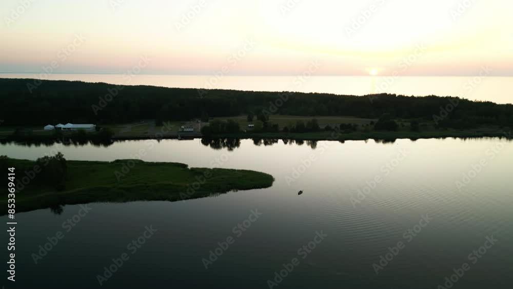Tranquil Aerial View of Serene Lake at Sunset. The calming landscape showcases the beauty of nature at its finest Tranquil Aerial View of Serene Lake at Sunset. The calming landscape showcases the beauty of nature at its finest