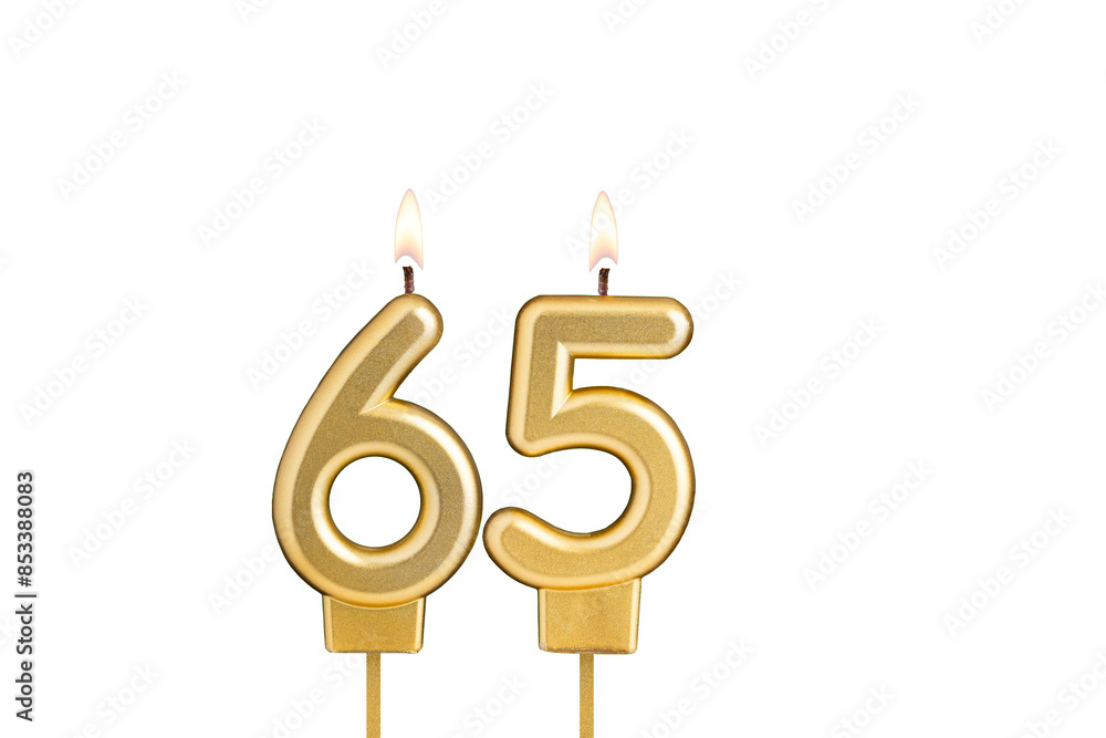 Golden number 65 birthday candle on white background Golden number 65 birthday candle on white background
