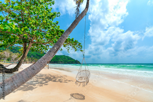 Seascape with tropical palms on beautiful Sao sandy beach in Phu Quoc island, Vietnam