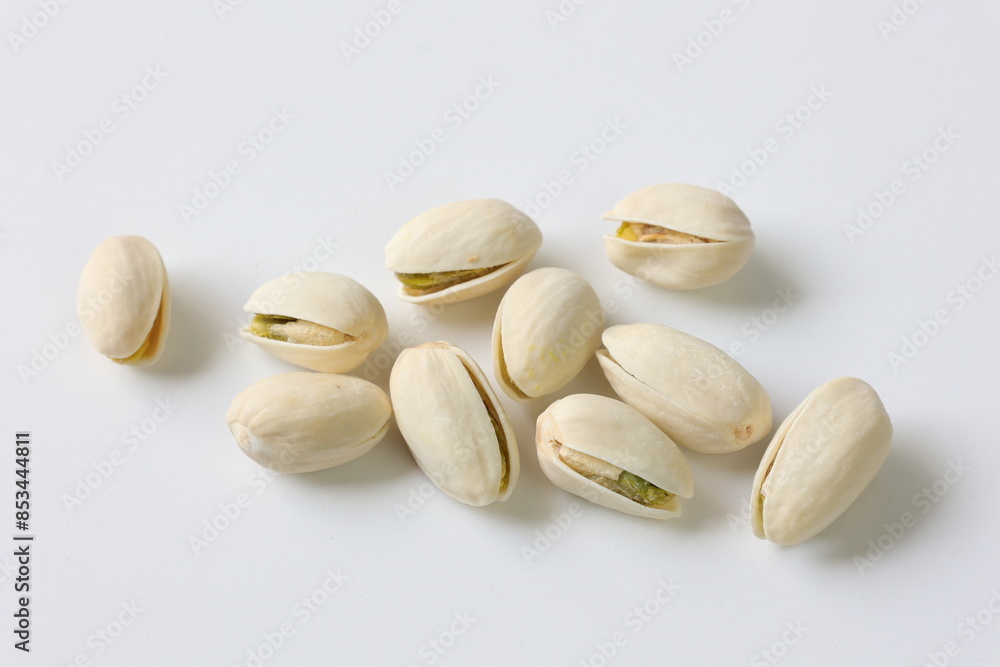 pistachio nuts on white background pistachio nuts on white background