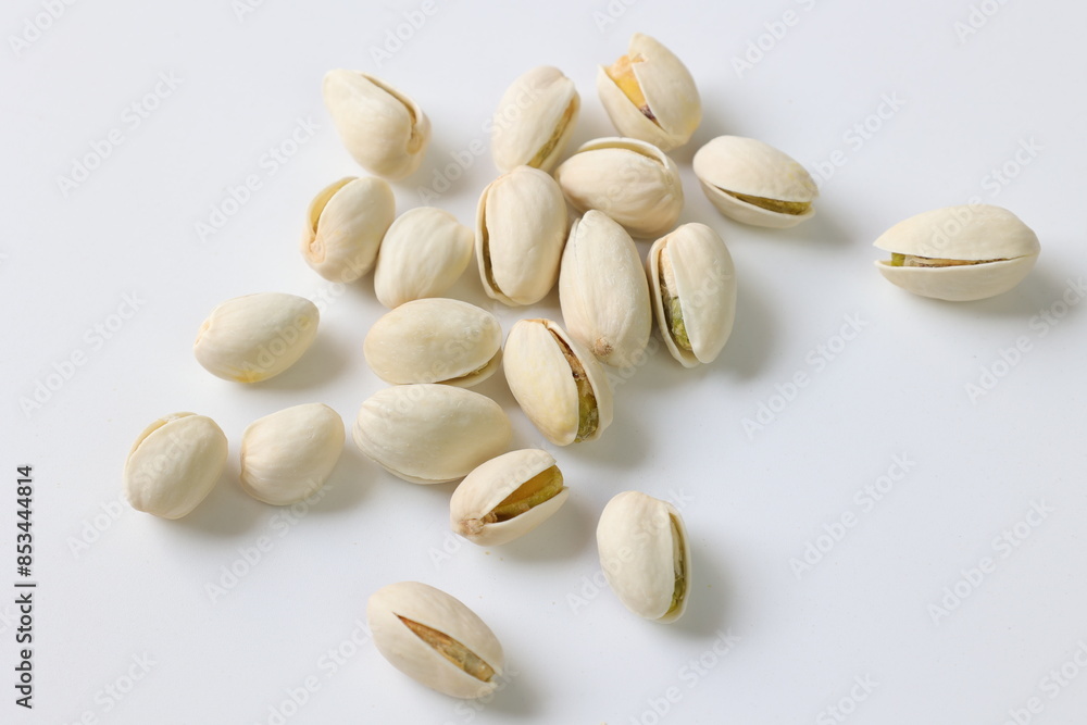 pistachio nuts on white pistachio nuts on white