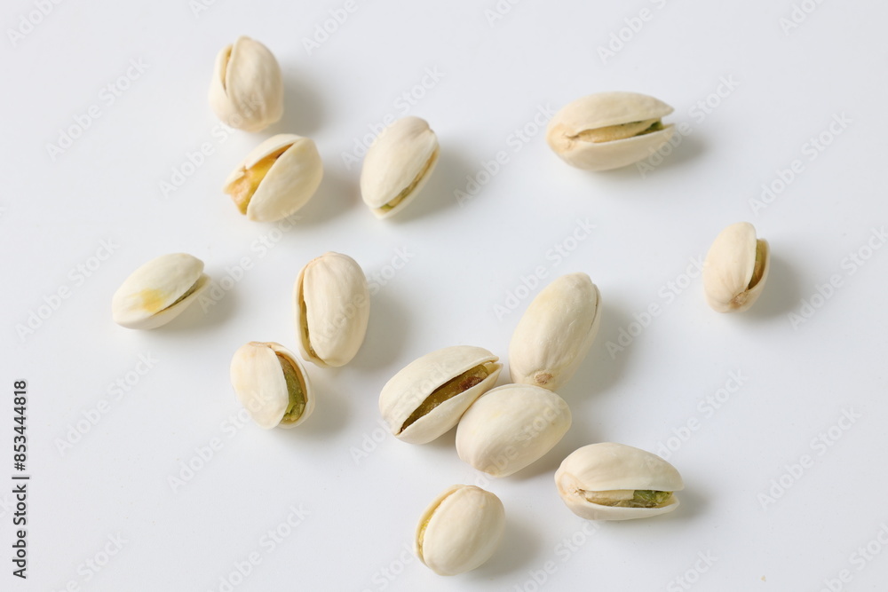 pistachio nuts on white background pistachio nuts on white background