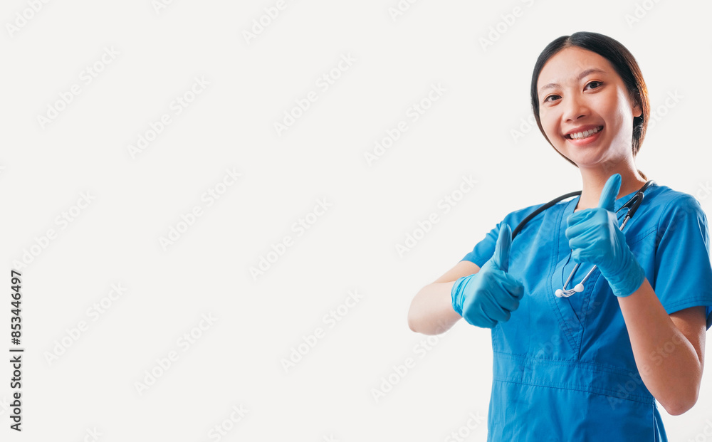 Doctor advice. Medical approval. Health care success. Happy smiling woman general practitioner showing thumbs up like gesture isolated on white empty space background. Doctor advice. Medical approval. Health care success. Happy smiling woman general practitioner showing thumbs up like gesture isolated on white empty space background.