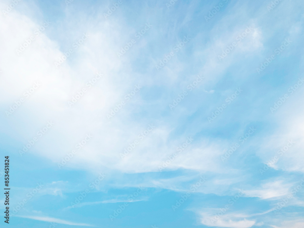 Beautiful clouds during spring time in a Sunny day. Blue sky and white fluffy clouds