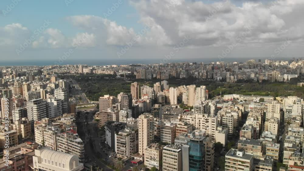 An aerial view of Beirut, Lebanon, highlighting the city's densely populated urban landscape with a mix of modern and traditional architecture. An aerial view of Beirut, Lebanon, highlighting the city's densely populated urban landscape with a mix of modern and traditional architecture.