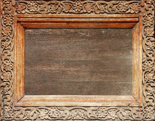 Bilde på lerret Texture of vintage wood boards with carved decorative border