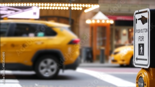 New York City Grand Central Terminal railway station, 42 street. Manhattan Midtown. Yellow taxi cab, car transport in NYC, USA. American urban road traffic, people pedestrians. Zebra crosswalk button.