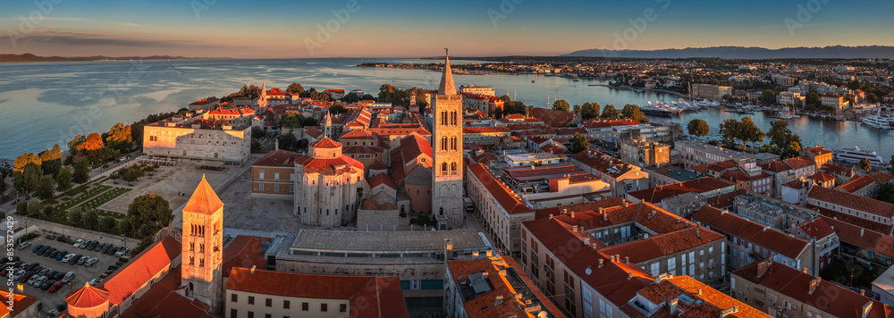 Zadar, Croatia - Aerial panoramic view of the old town of Zadar by the Adriatic sea with Church of St. Donatus and the Cathedral of St. Anastasia and blue sky on a bright summer morning with blue sky