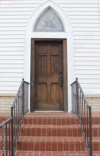 Close up of Door and Steps on Small White Church