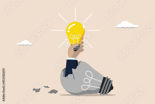 Failure to success, learning from mistakes, attempt to create new innovation, businessman rises from a broken light bulb to get a bright idea light bulb.