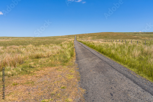 Rural road in the Peak District between Daddry Shield and Newbiggin, County Durham, England, UK photo