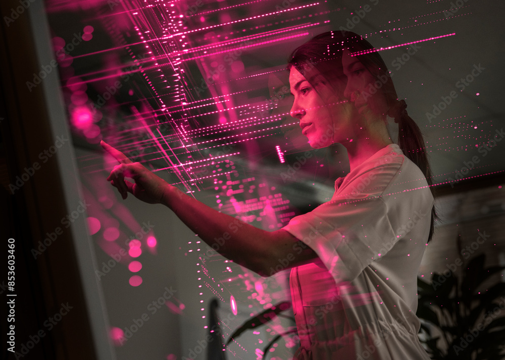 © Westend61 - Young scientist examining and using screen of AI technology