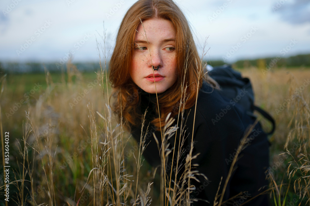 Hipster woman at agricultural field Hipster woman at agricultural field