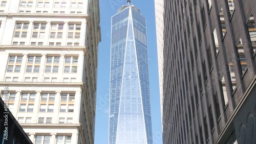 New York City Lower Manhattan, Downtown Financial District architecture, United States. One World Trade Center skyscraper building, Fulton street, USA. American urban scene. WTC Freedom tower in NYC. photo