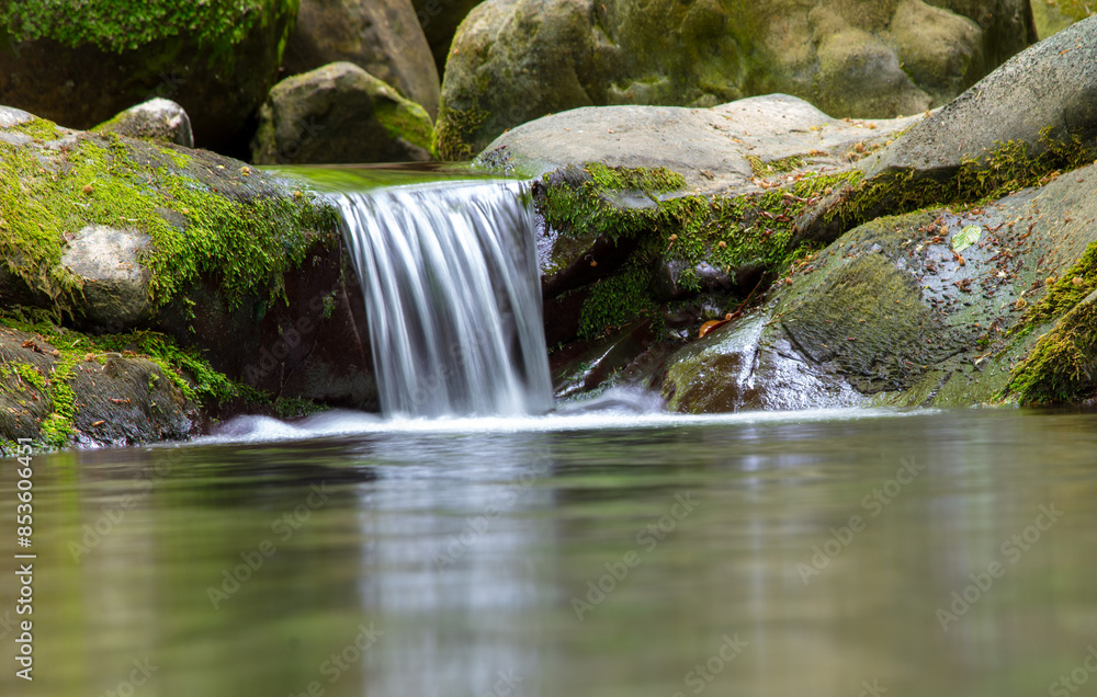 Waterfall on the river in nature in summer Waterfall on the river in nature in summer