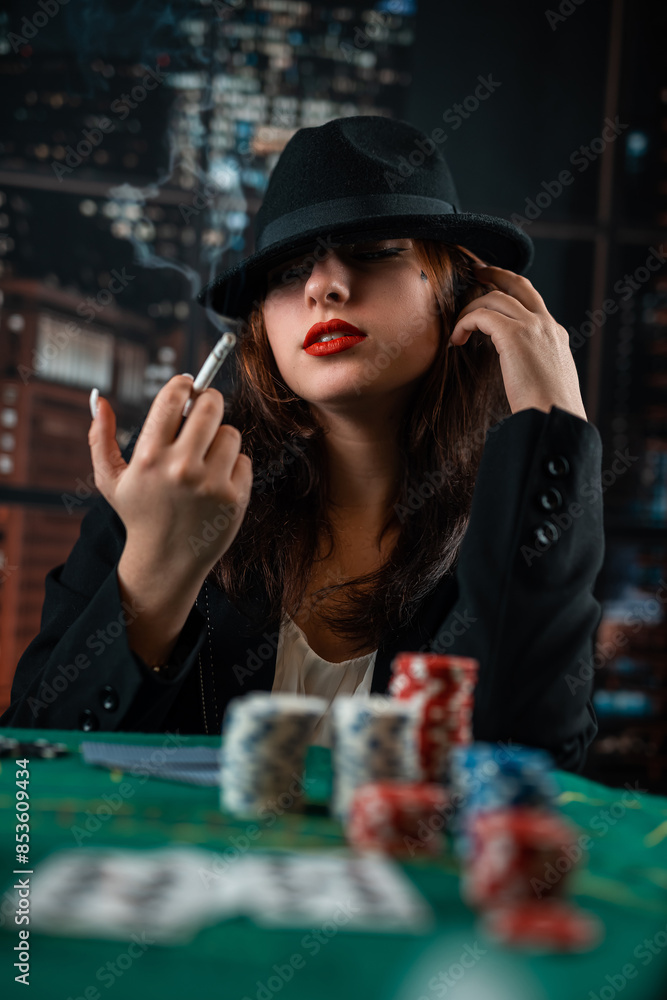 image of a young sexy woman playing poker with a cigarette and smoke coming out of it. poker in the casino image of a young sexy woman playing poker with a cigarette and smoke coming out of it. poker in the casino