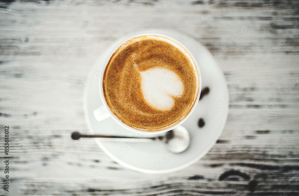 Fototapeta premium Cup with cappuccino, latte on table.