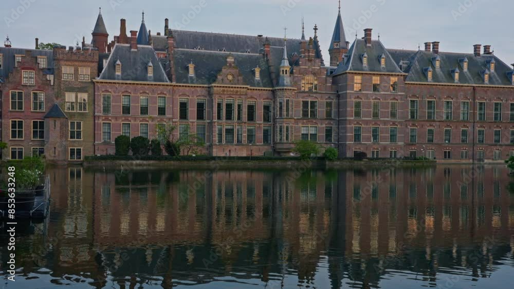 Parliament buildings in the Hague. Binnenhof castle Dutch Parliament in downtown Hague at sunset Parliament buildings in the Hague. Binnenhof castle Dutch Parliament in downtown Hague at sunset