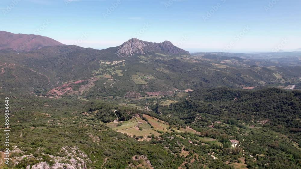 Aerial view of mountain landscape with greenery and clear skies, perfect for outdoor adventure, Castillo del Aguila, Gaucin pueblo, Malaga Spain Aerial view of mountain landscape with greenery and clear skies, perfect for outdoor adventure, Castillo del Aguila, Gaucin pueblo, Malaga Spain