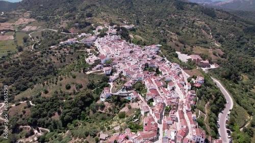 Aerial view showcases a picturesque mountain village set in the tranquil Mediterranean region. Castillo del Aguila, Gaucin pueblo, Malaga Spain photo