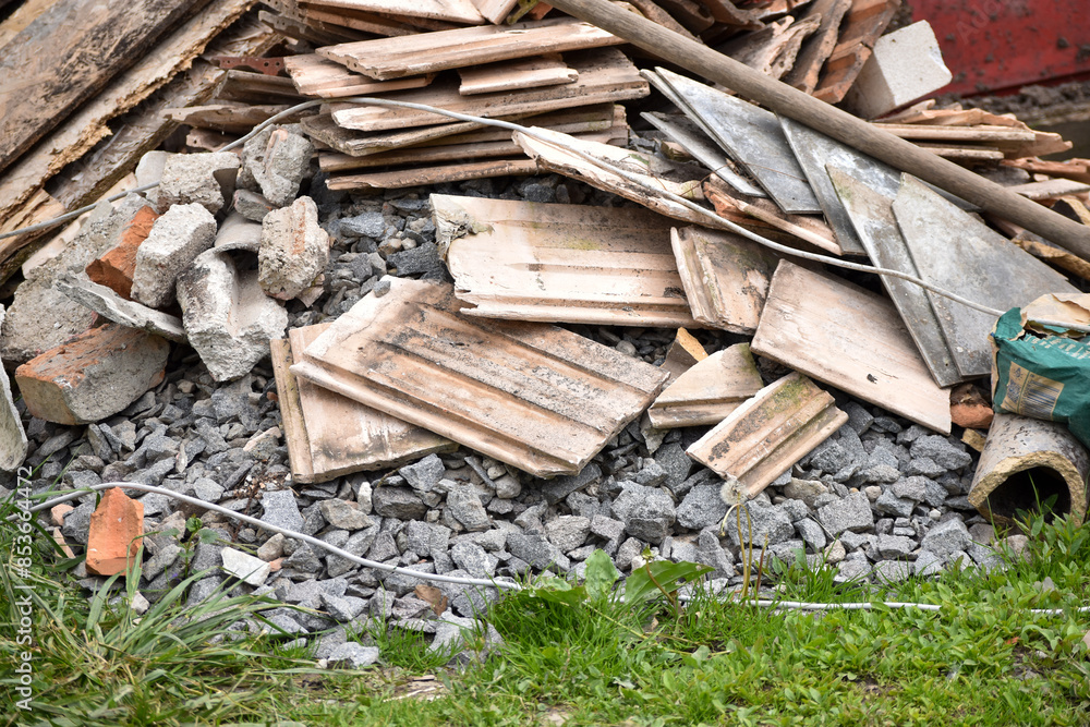 Piles of broken floor tiles from house renovations Piles of broken floor tiles from house renovations