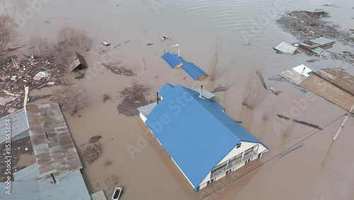 The flooded city. Damaged houses in the flood. The houses were washed away by the current of the water. A city destroyed by a flood. A natural disaster, an emergency. An environmental disaster. Damage