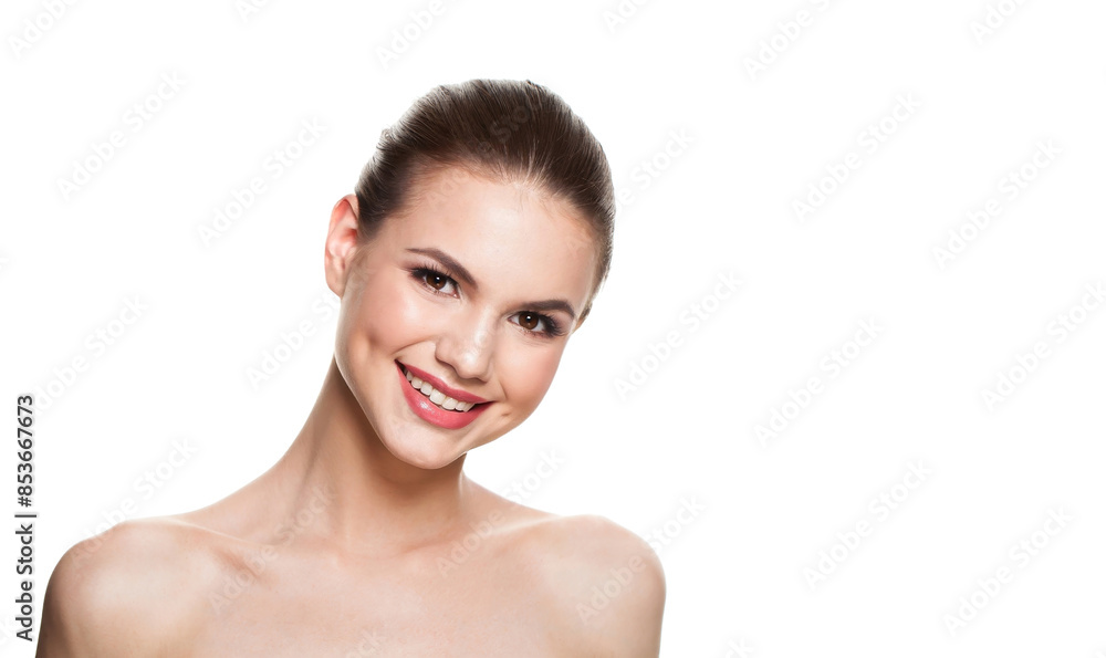 Happy young adult woman with healthy fresh clear skin looking at camera posing on grey background. Beautiful face of female model with natural cosmetic, studio portrait Happy young adult woman with healthy fresh clear skin looking at camera posing on grey background. Beautiful face of female model with natural cosmetic, studio portrait