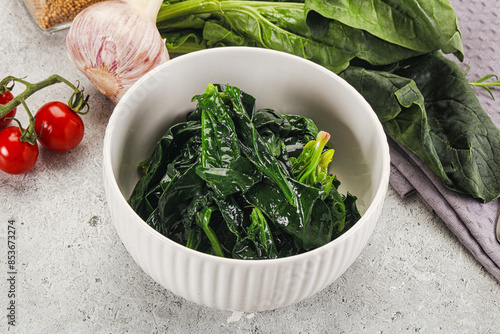 Картината върху платно Coocked green spinach with oil