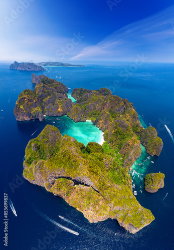 Concept touristic landmark of Thailand, travel photo by drone. Amazing aerial view of Ko Phi Phi Leh with Maya Bay in Andaman sea Krabi