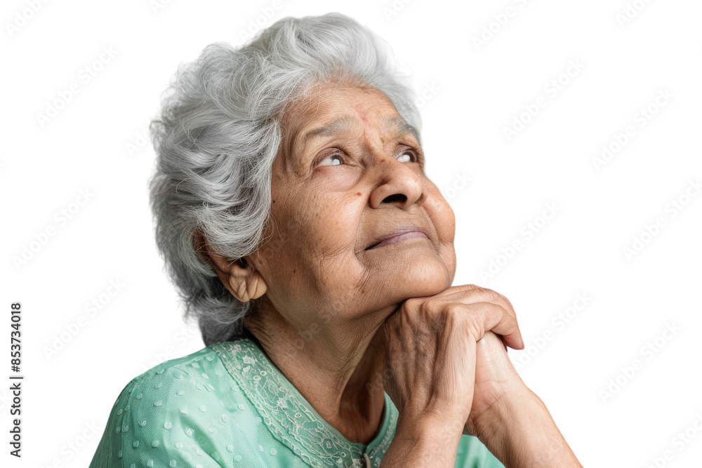 Elderly Indian woman looking up, thinking, and feeling hopeful with an idea. Elderly Indian woman looking up, thinking, and feeling hopeful with an idea.