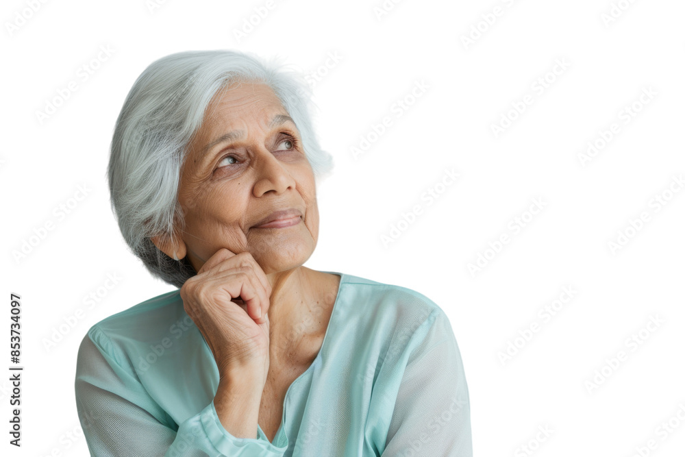 Elderly Indian woman looking up, thinking, and feeling hopeful with an idea. Elderly Indian woman looking up, thinking, and feeling hopeful with an idea.