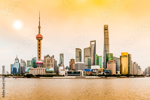 Photography Colorful sunset over the financial district of Shanghai, China