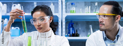 Banner of scientists analyzing the results of biofuels produced from natural extracts for sustainable, renewable energy, reduce carbon emissions, environment, global warming innovations replace oil.