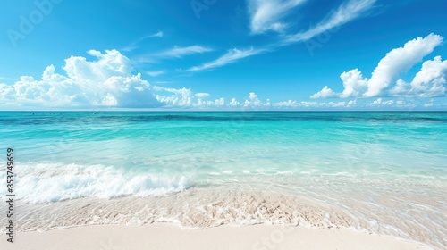 Beautiful beach with white sand and pristine water on a picturesque island.