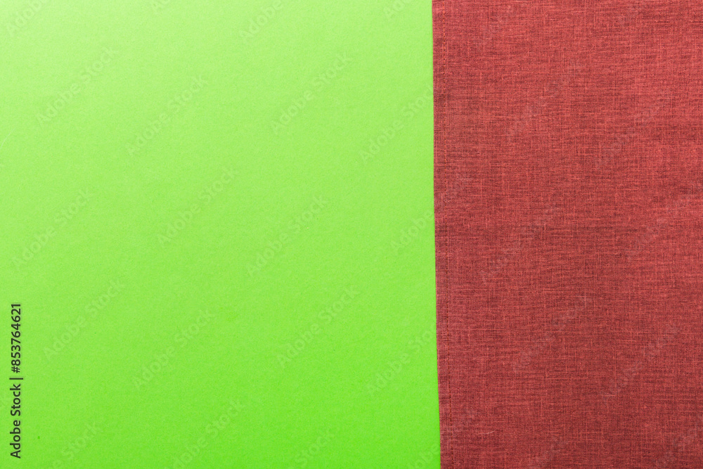 top view with red empty kitchen napkin isolated on table background. Folded cloth for mockup with copy space, Flat lay. Minimal style top view with red empty kitchen napkin isolated on table background. Folded cloth for mockup with copy space, Flat lay. Minimal style