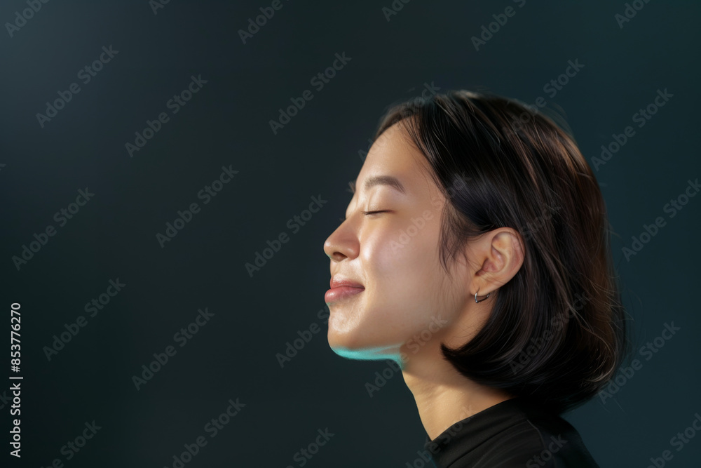 Profile view image of a beautiful Asian woman Profile view image of a beautiful Asian woman