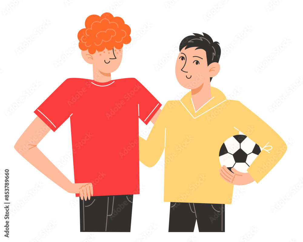 Two brothers are standing next to each other holding soccer balls Two brothers are standing next to each other holding soccer balls