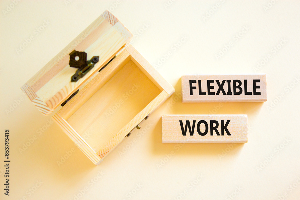 Flexible work symbol. Concept words Flexible work on beautiful wooden block. Beautiful white paper background. Empty wooden chest. Business Flexible work concept. Copy space. Flexible work symbol. Concept words Flexible work on beautiful wooden block. Beautiful white paper background. Empty wooden chest. Business Flexible work concept. Copy space.